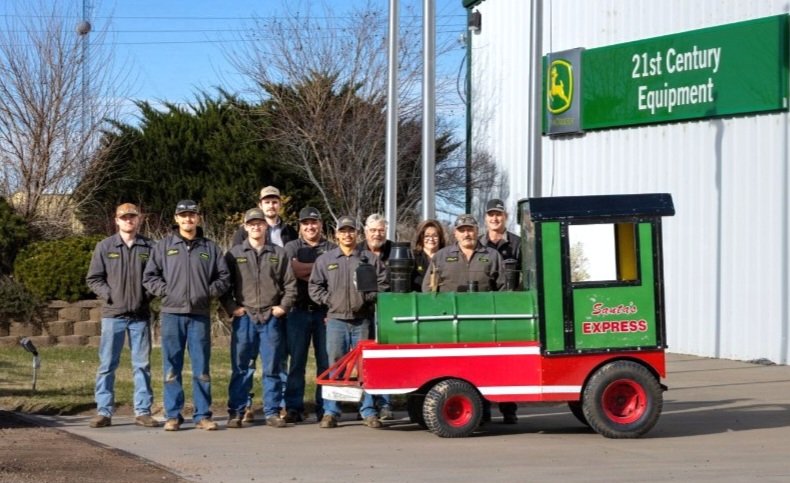 Lamar’s 21st Century Equipment considered “holiday heroes” by Lamar Rotary Club and Lamar Public Library for repairs to Santa’s Express
